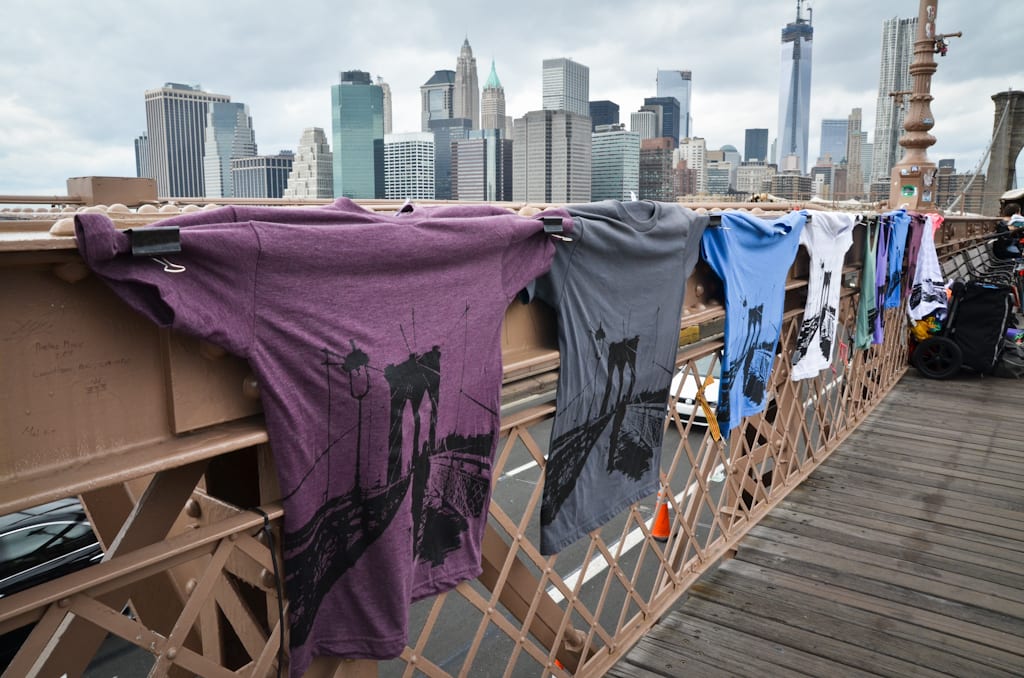 Shirts on the Brooklyn Bridge, with the outline of the bridge on them.