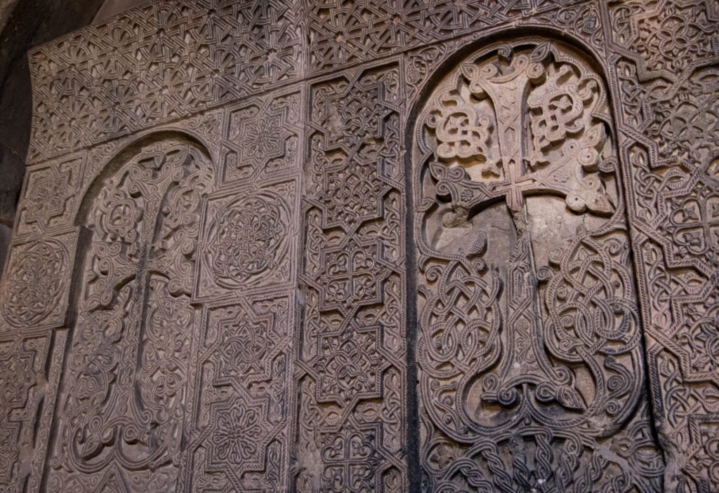 Ornate carvings on an Armenian monastery in the shape of crosses.