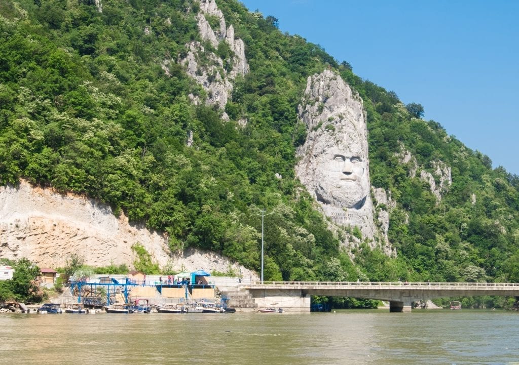A face carved into the limestone cliffs on the Romanian side of the Danube.